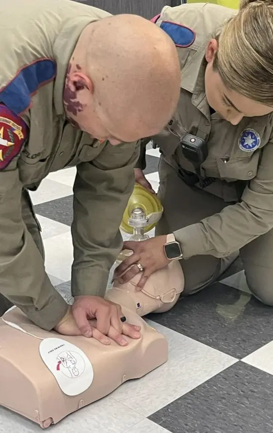 Elite Medical Training Solutions students performing CPR training on a medical manikin